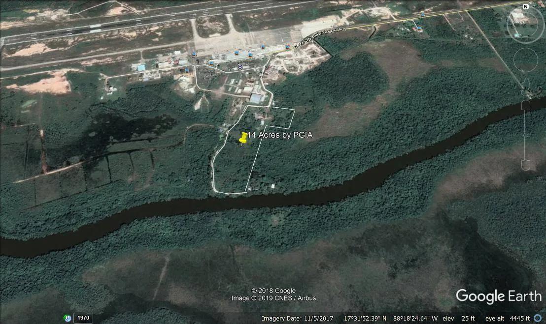 14 acres of riverside land located close to the International Airport and containing a warehouse and - Photo 6