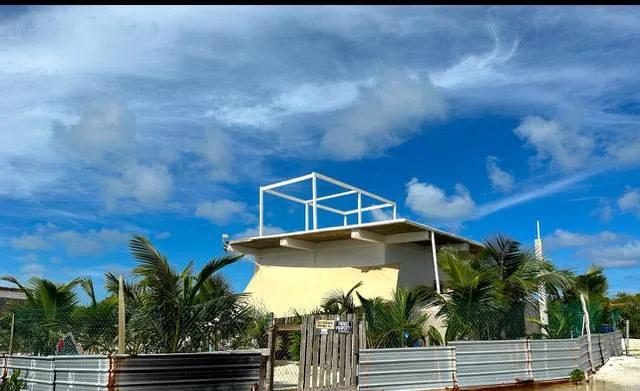 Western Sea and Sunset View lot including a One Bedroom Project Home- North Caye Caulker