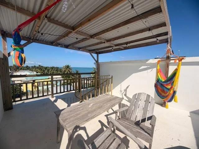Prime Village Location! 1- Bedroom Condo with Private Rooftop Terrace in the Heart of Caye Caulker