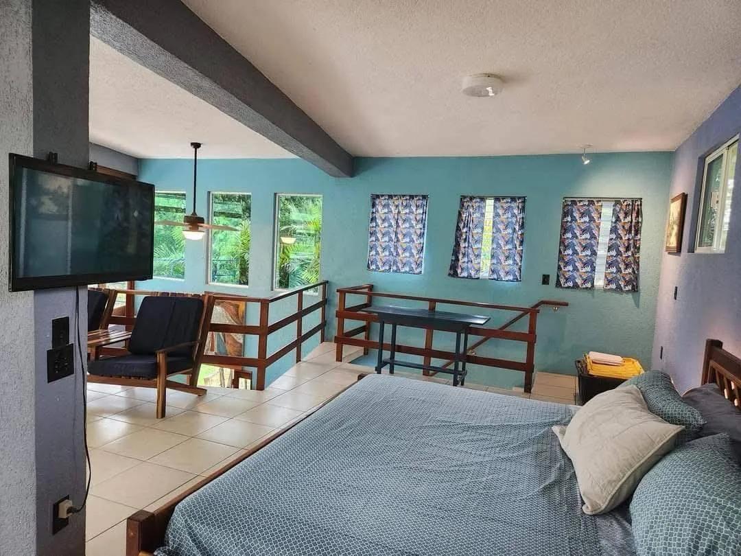 Riverfront Retreat in Bullet Tree Falls, Cayo District – 3 Floors of Paradise (With Cash Flow!) - Photo 8